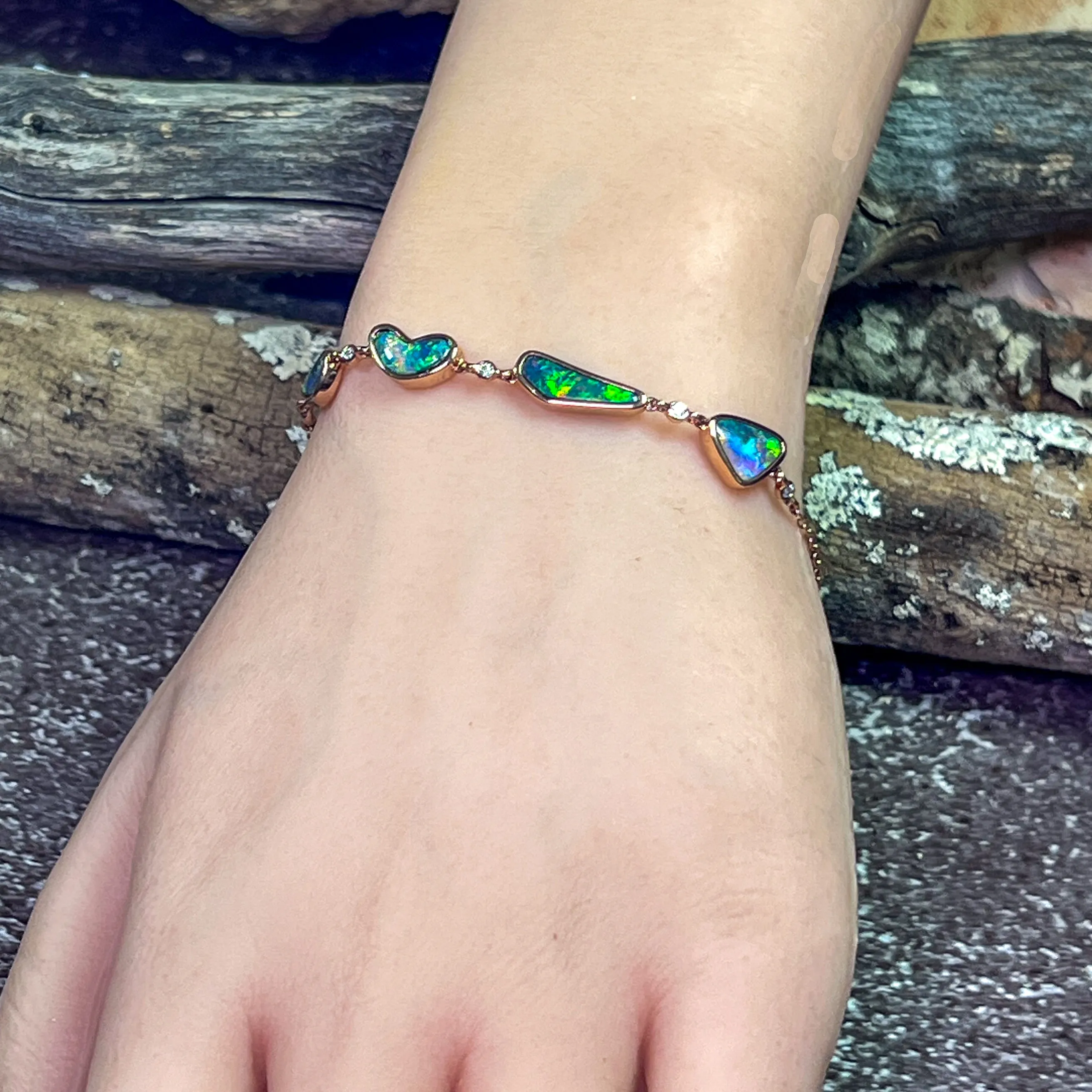 14kt Rose Gold Bracelet 4 Freeform Black Opal and diamond bracelet