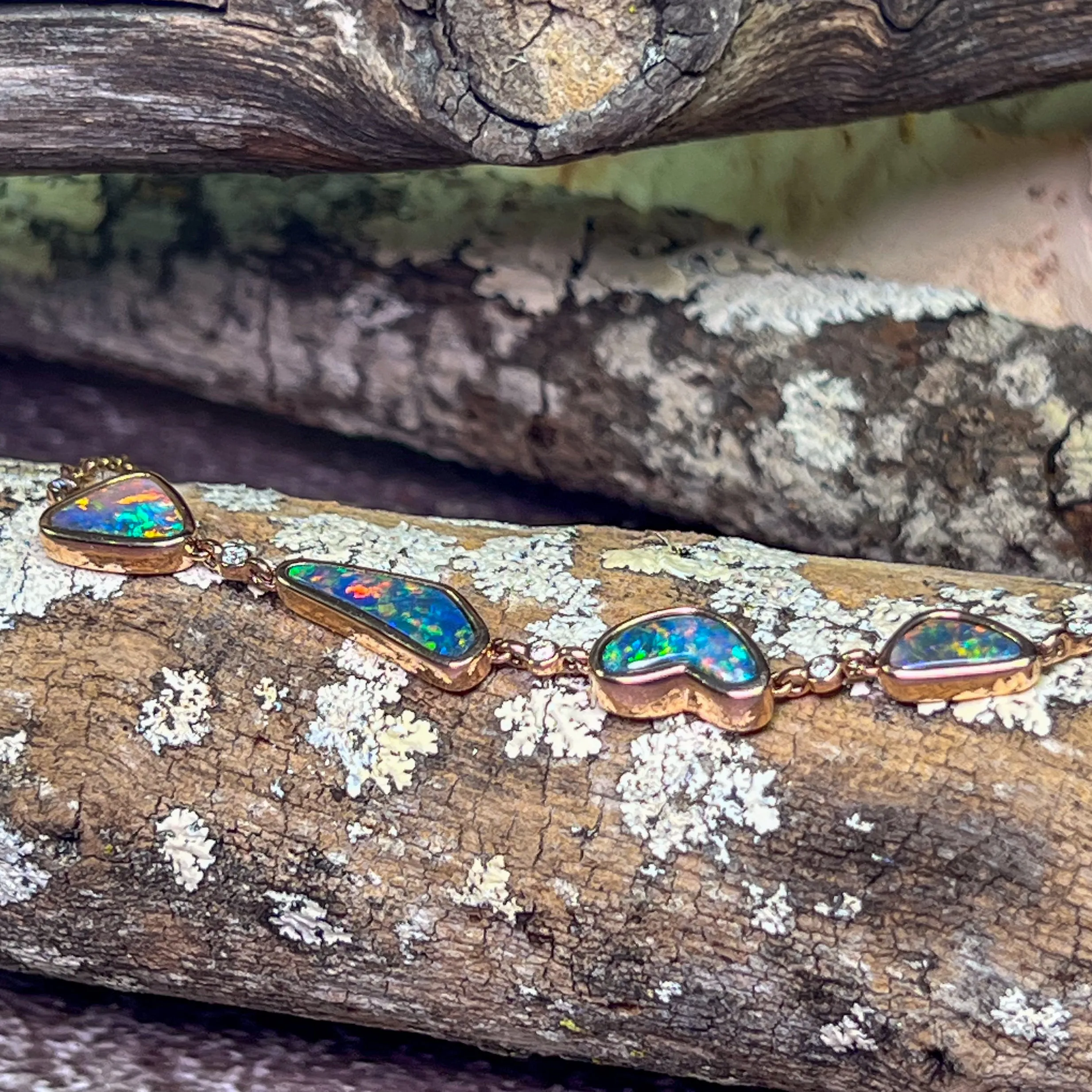 14kt Rose Gold Bracelet 4 Freeform Black Opal and diamond bracelet