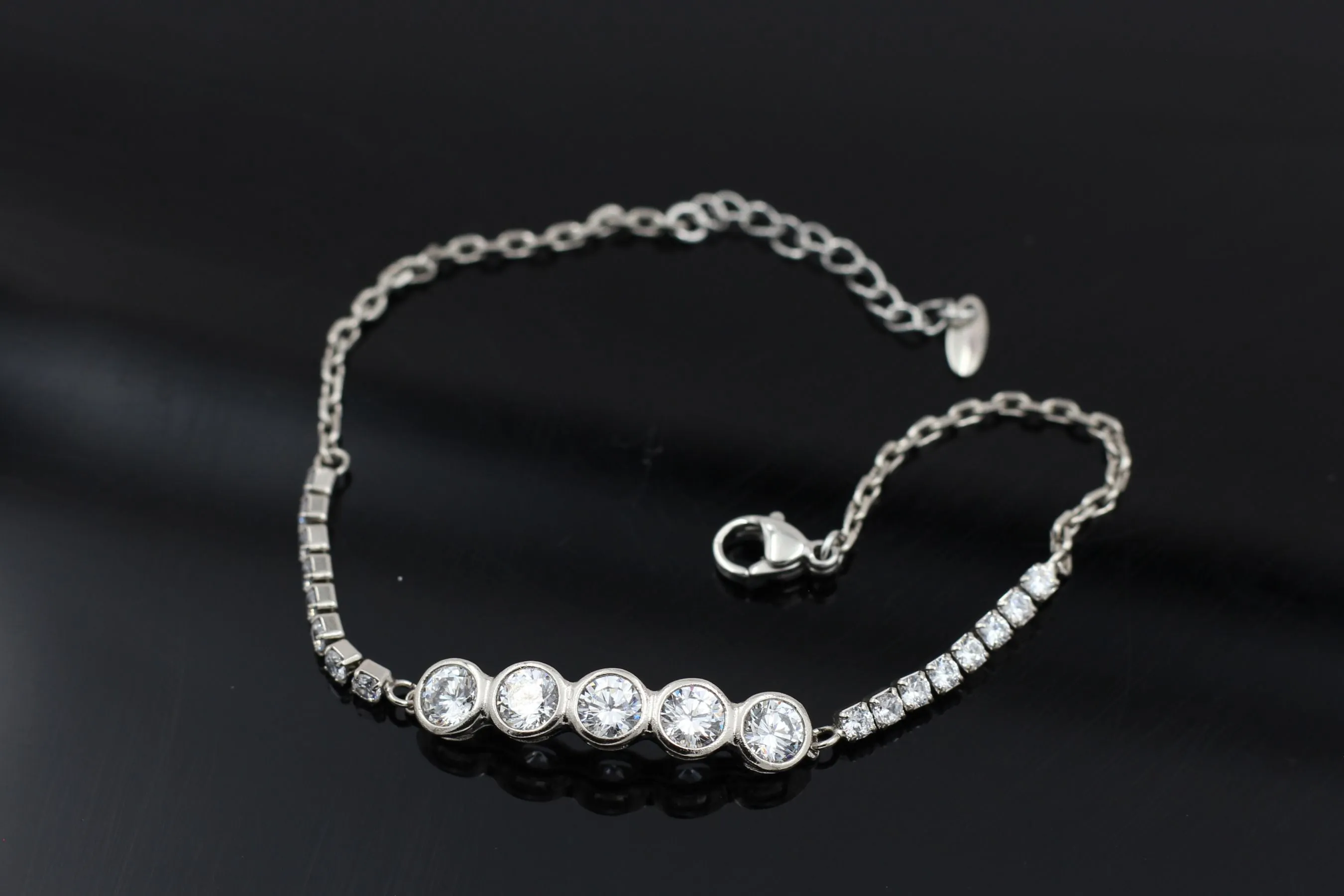 Chic XUPING Silver Bracelet with Dazzling White Stones - JCSFashions