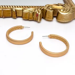 Gold Tone Large Hoop Earrings With a Textured Inside